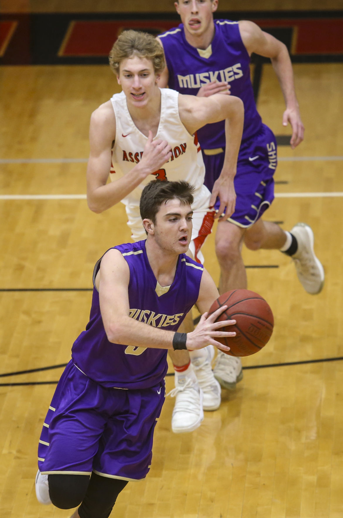 010918-MUSCATINE-ASSUMPTION-BASKETBALL-018